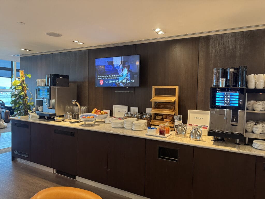 a coffee machine and food on a counter
