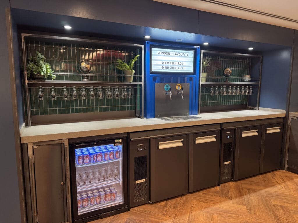 a bar with drinks and glasses