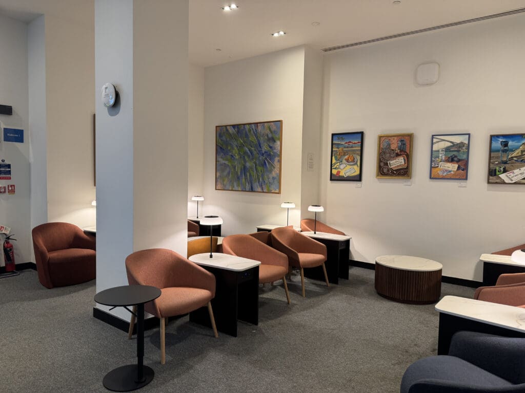 a room with chairs and tables