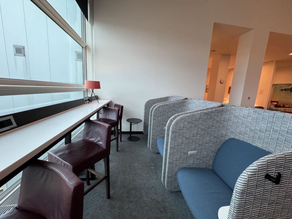 a room with chairs and tables