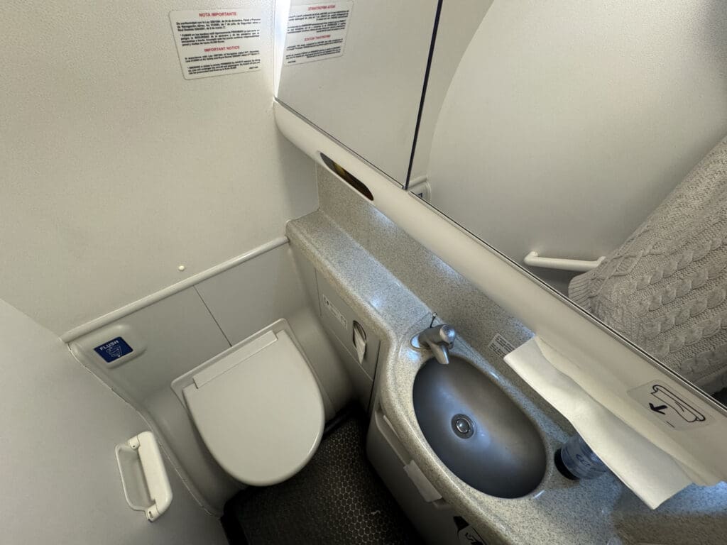 a sink and toilet in a plane