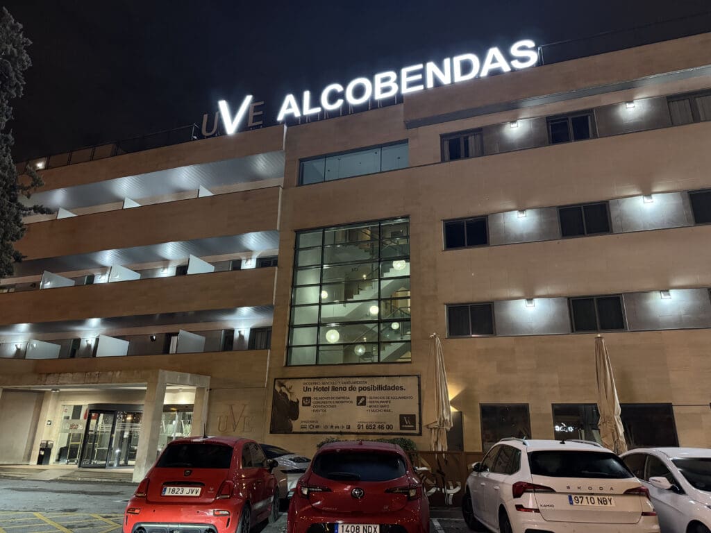 a building with cars parked in front of it