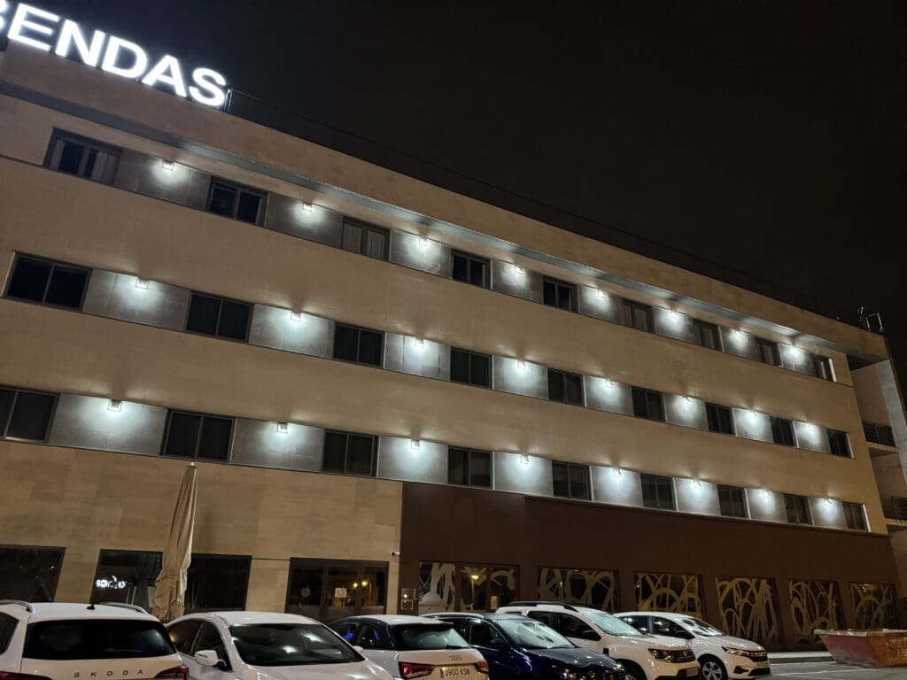 a building with lights on the top