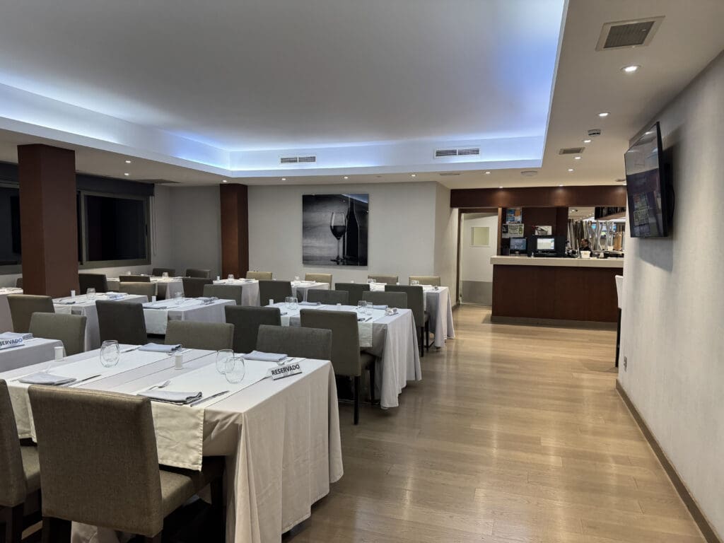 a room with tables and chairs