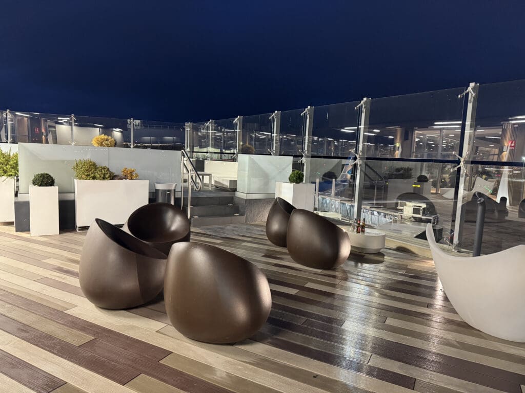 a group of chairs on a deck