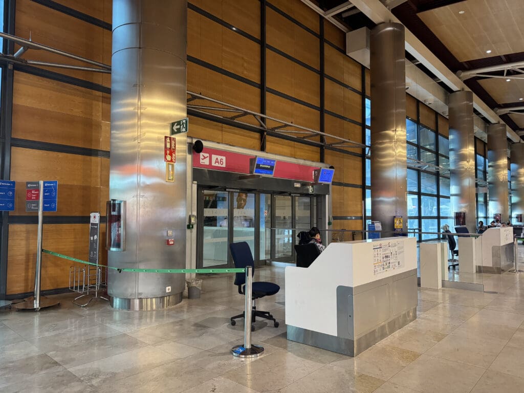 a person sitting at a desk in a building
