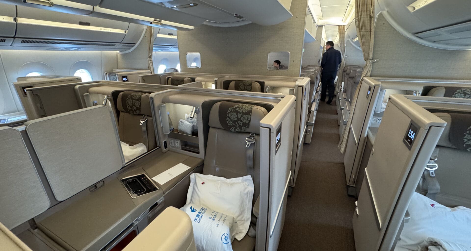 a person standing in the middle of an airplane