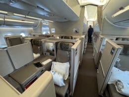 a person standing in the middle of an airplane