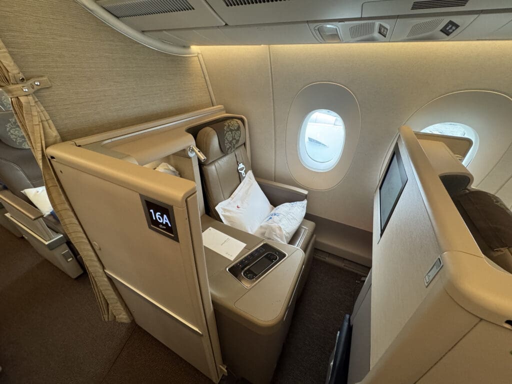 an airplane with a seat and a table