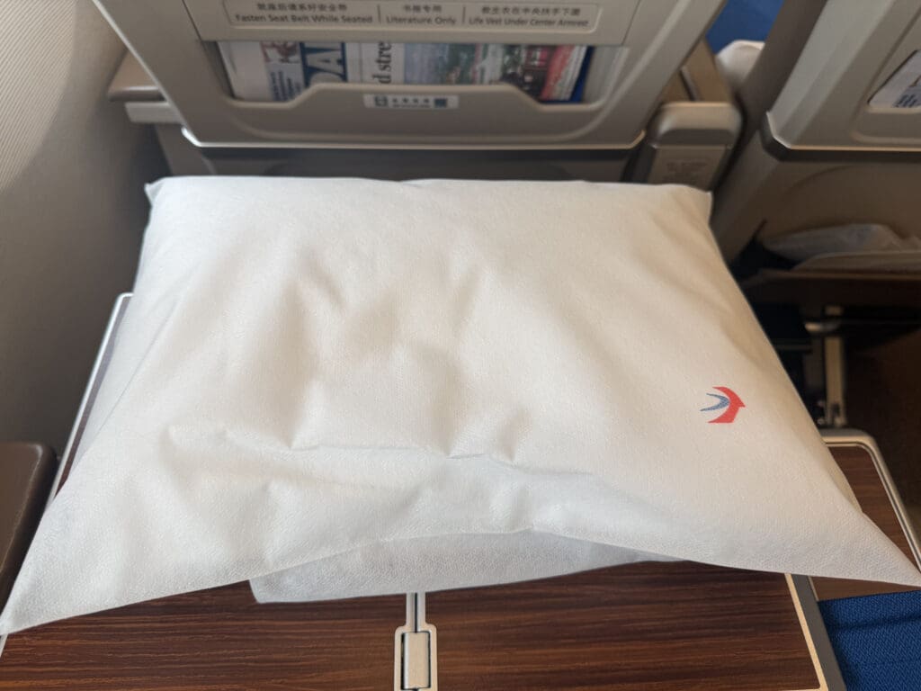 a white pillow on a table