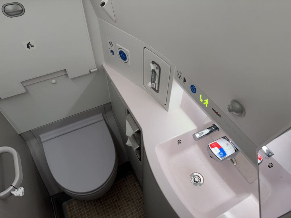 a sink and toilet in a bathroom