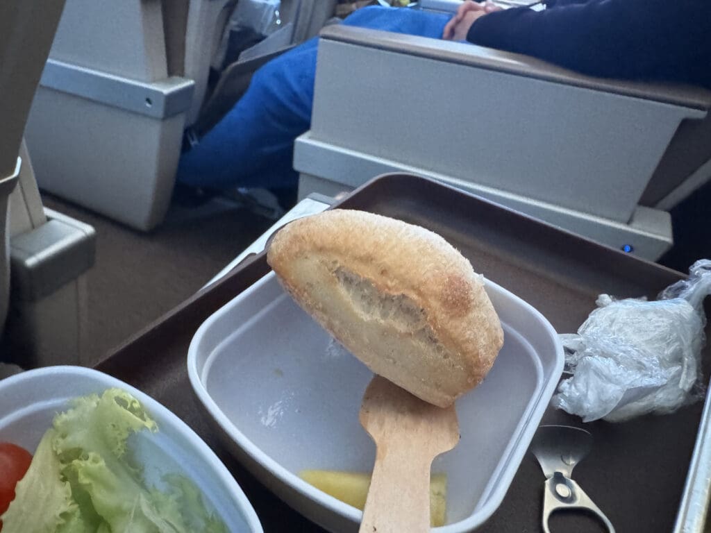 a food in a container on a tray