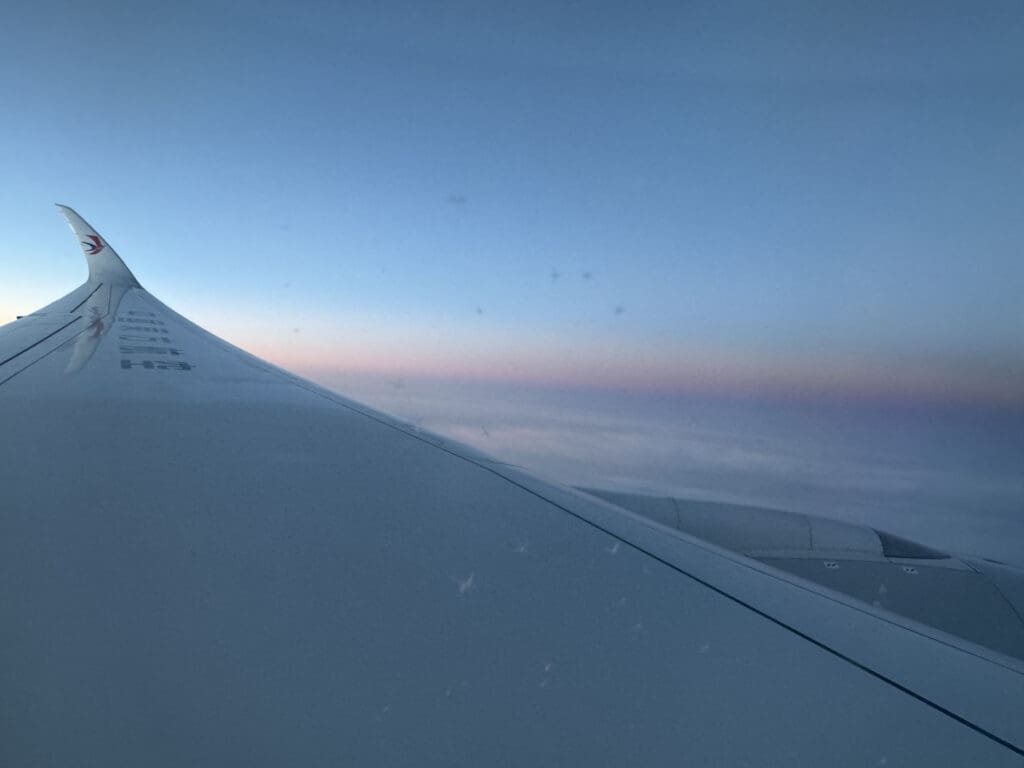 an airplane wing in the snow