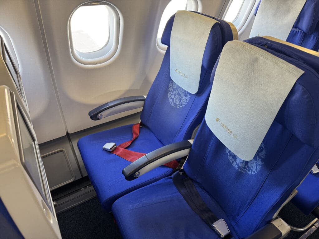 a blue seats in an airplane