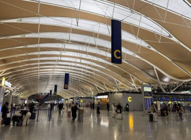 people walking in a large airport