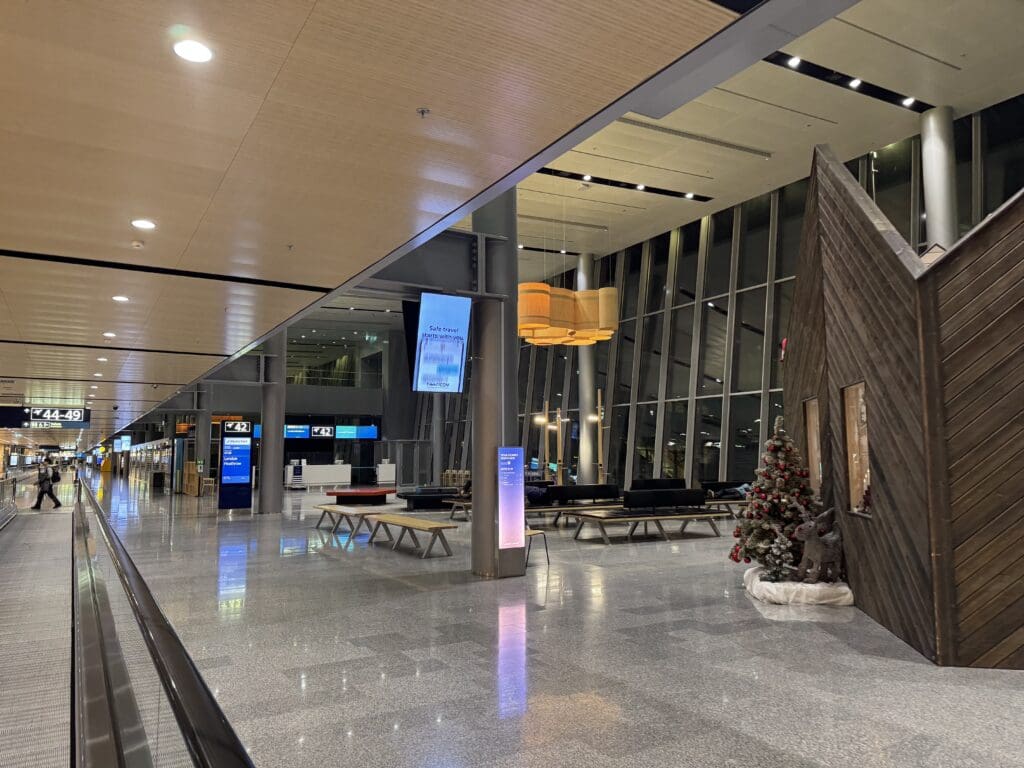a large building with a christmas tree and a window