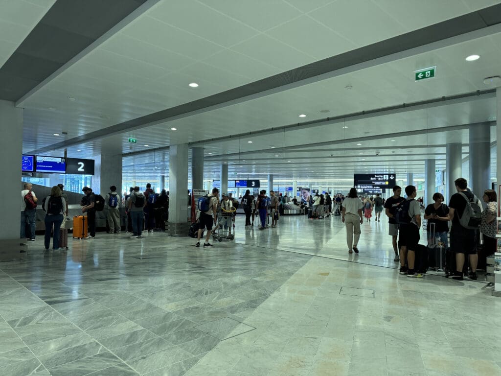 a group of people in a large room