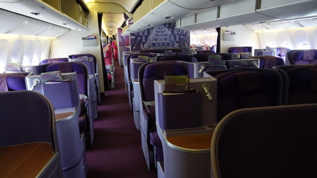 a plane with purple seats