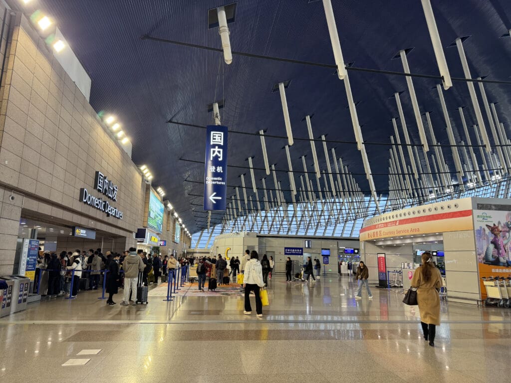 a group of people in a large building