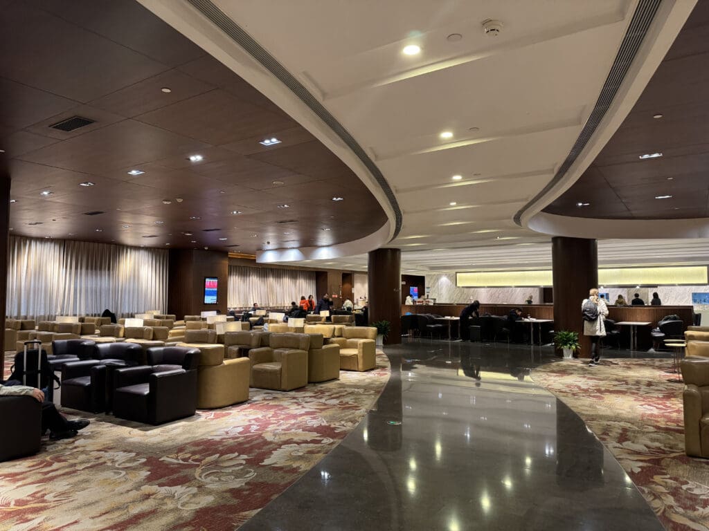 a large room with chairs and tables