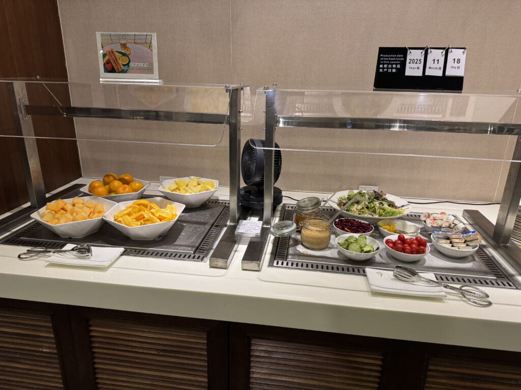 a buffet with different food items on it