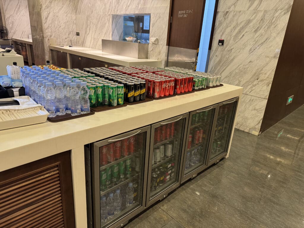 a group of cans and bottles on a counter