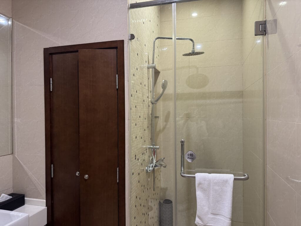 a shower with a glass door