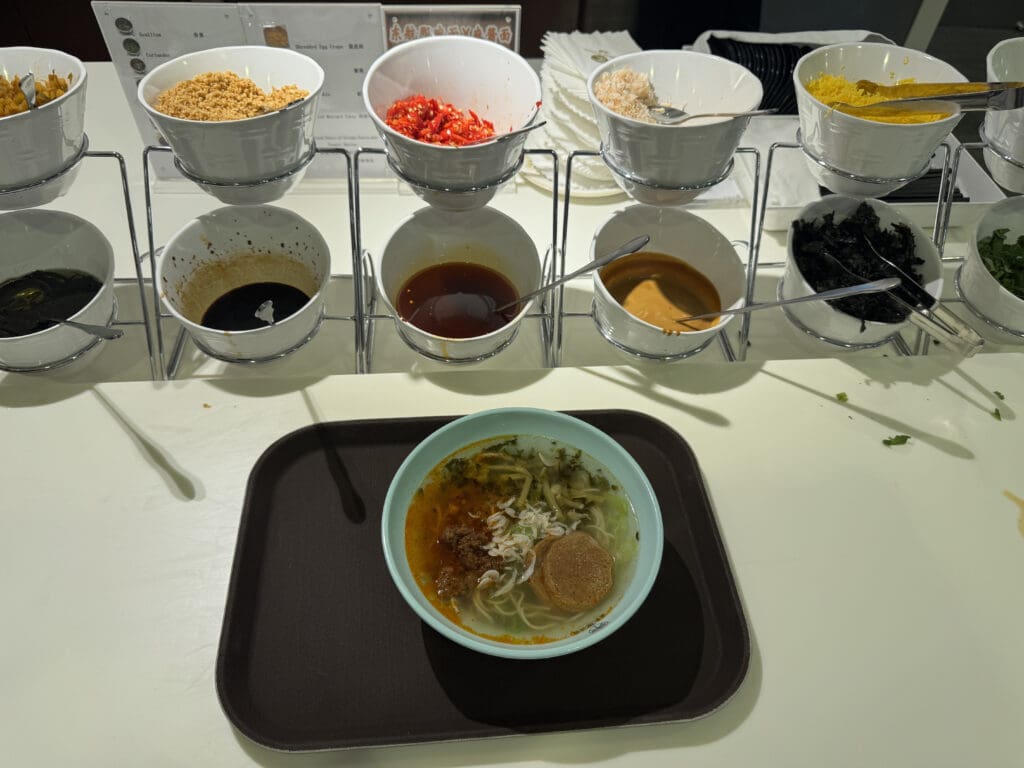 a group of bowls of food on a table