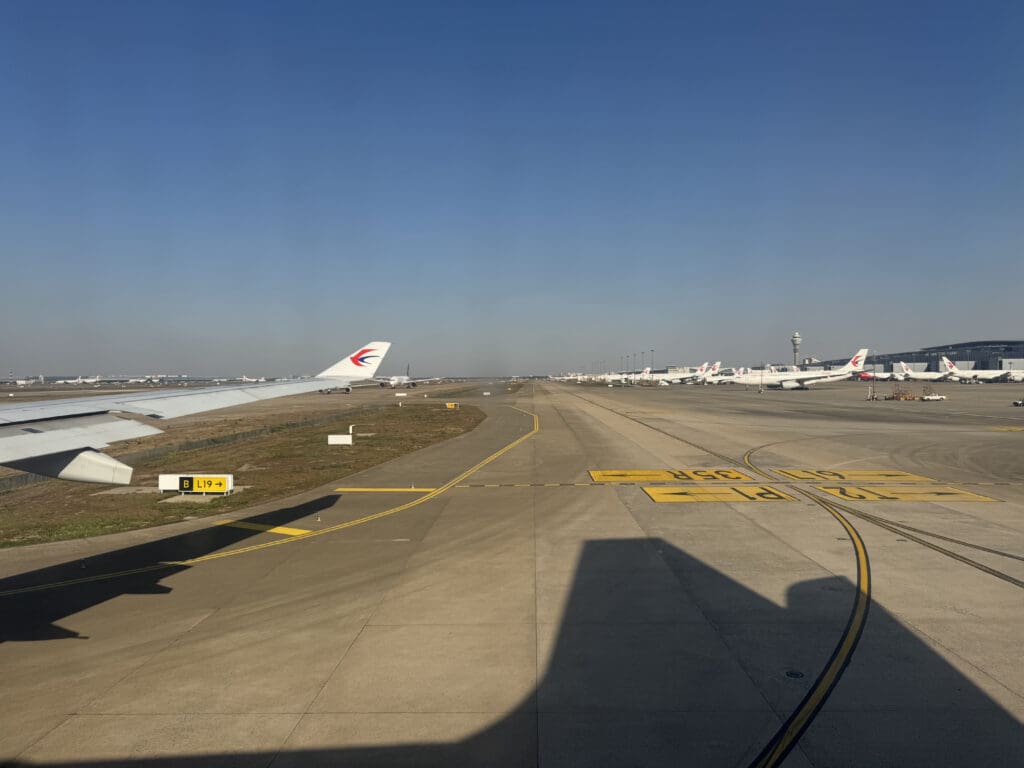 a runway with airplanes on it