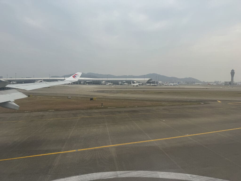 a group of airplanes on a runway