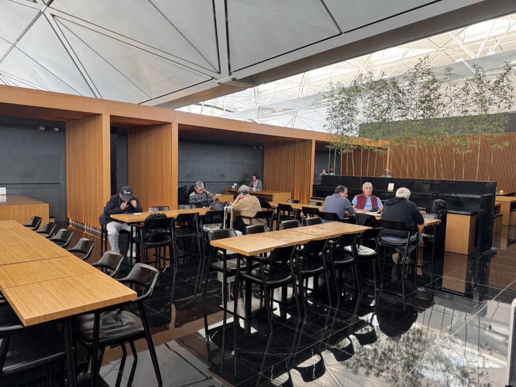 a group of people sitting at tables in a room
