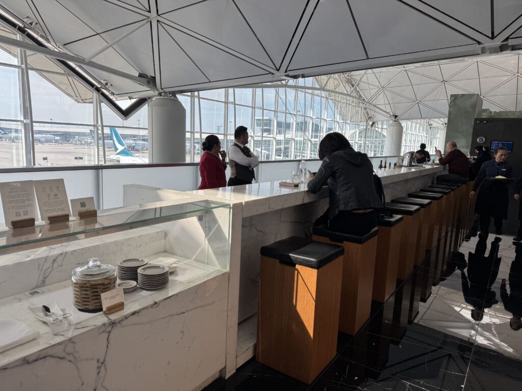 people at a counter in a building