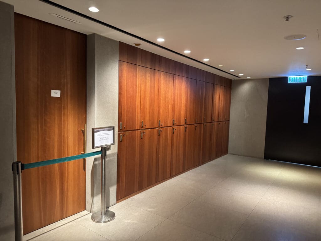 a room with wooden doors and a black door