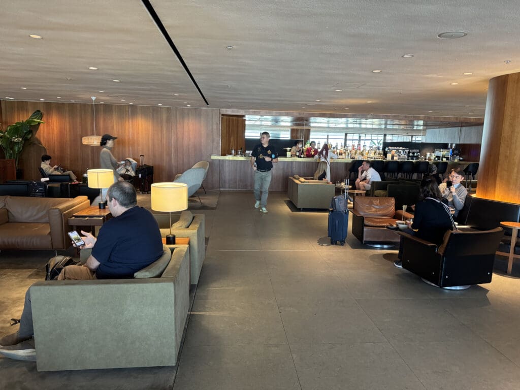 a group of people sitting in a lounge area