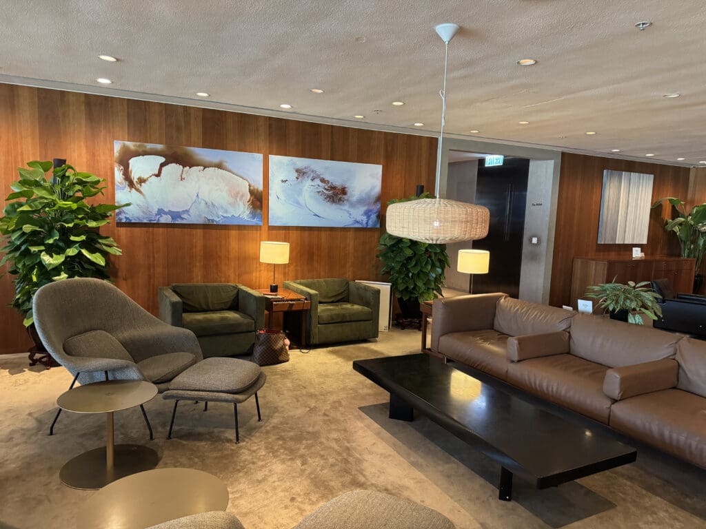 a room with couches and chairs