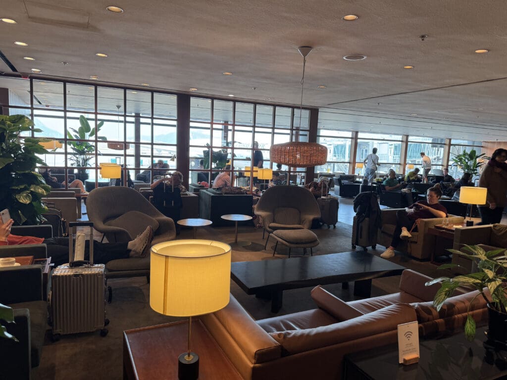 a room with many chairs and tables and chairs