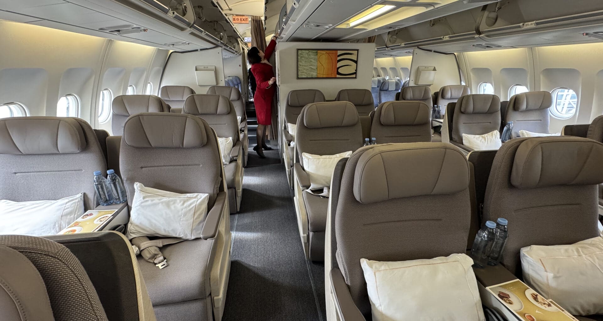 a person standing in the back of an airplane