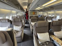 a person standing in the back of an airplane