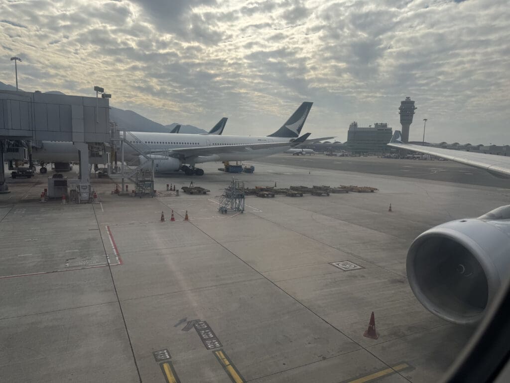 an airport with airplanes on the ground