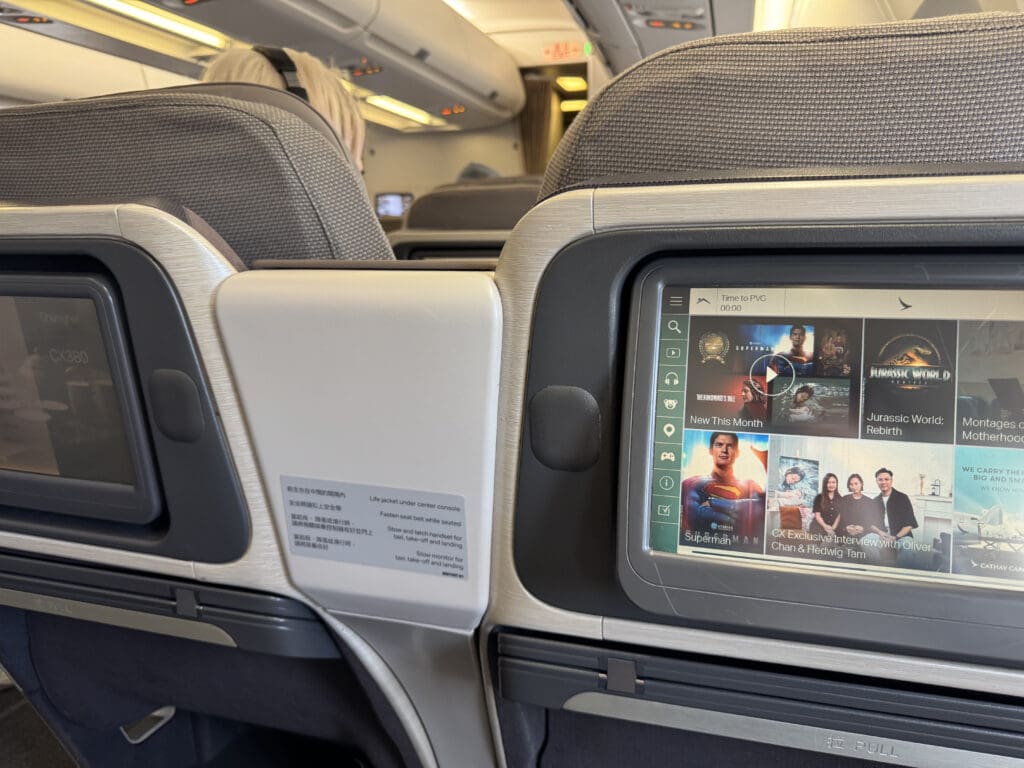 a screen on the side of an airplane