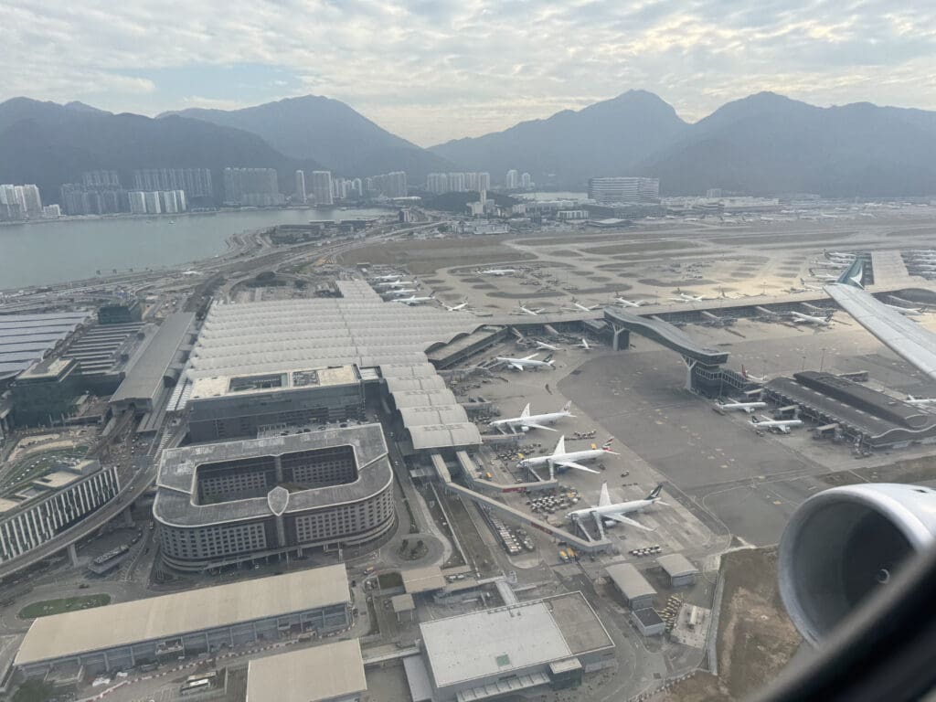 an aerial view of an airport with many airplanes