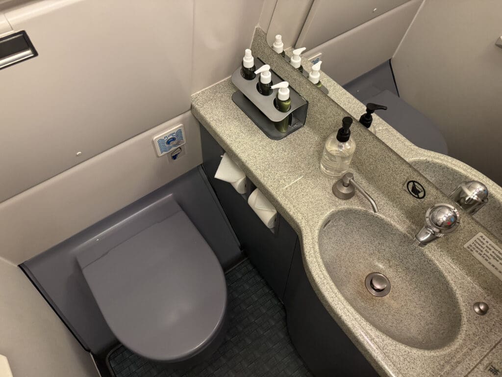 a sink and toilet in a bathroom