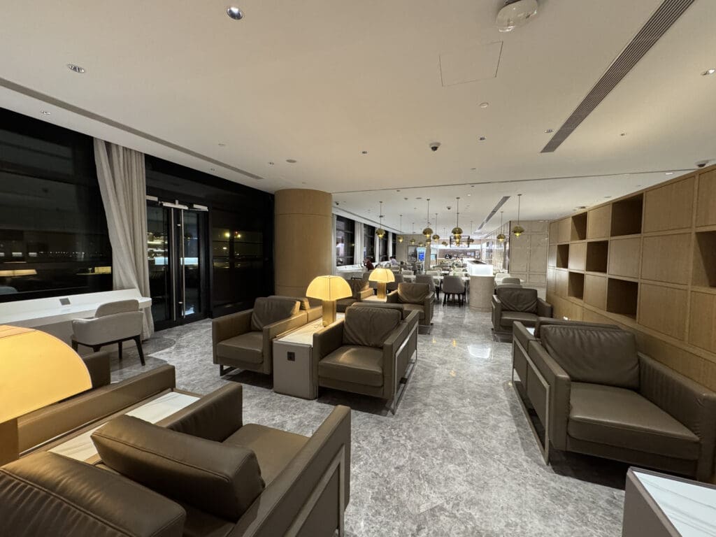 a room with brown furniture and a white ceiling