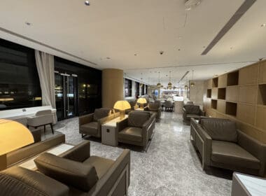 a room with brown furniture and a white ceiling