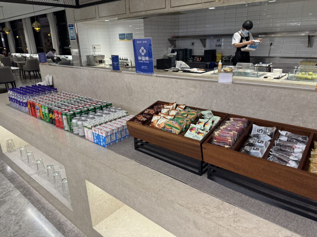 a counter with food and drinks in it