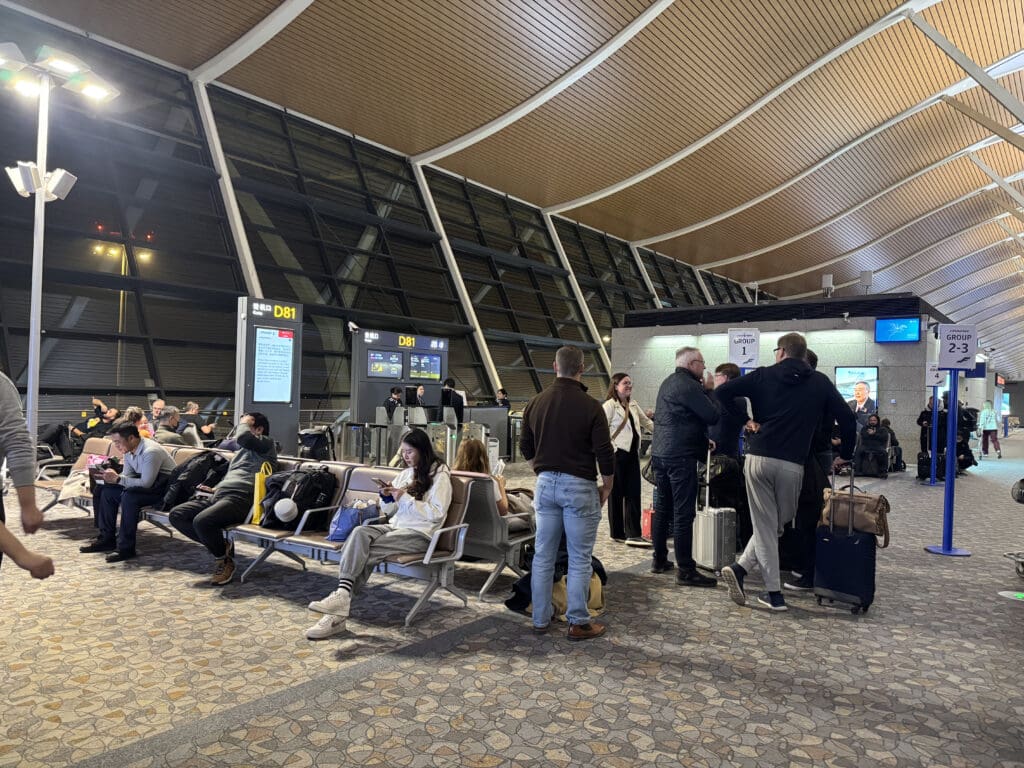 a group of people in an airport