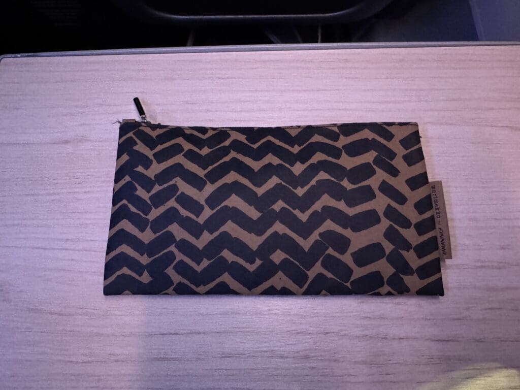 a brown and black bag on a table