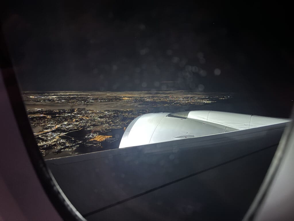 a view of a city from an airplane window