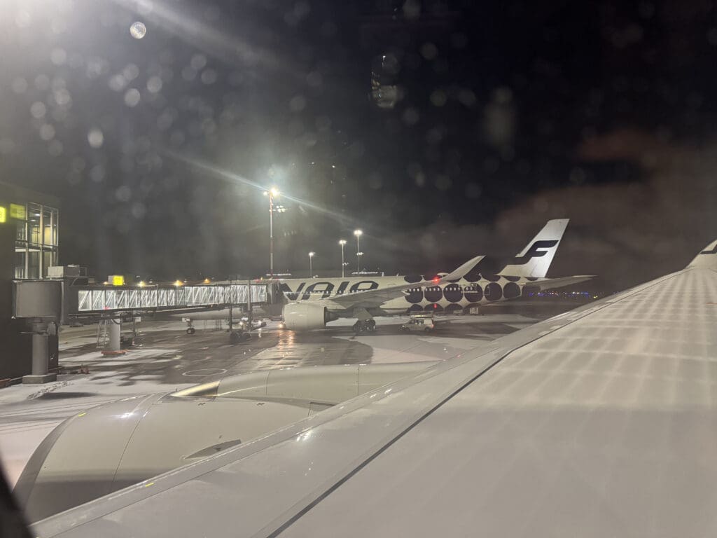 a plane on the runway at night