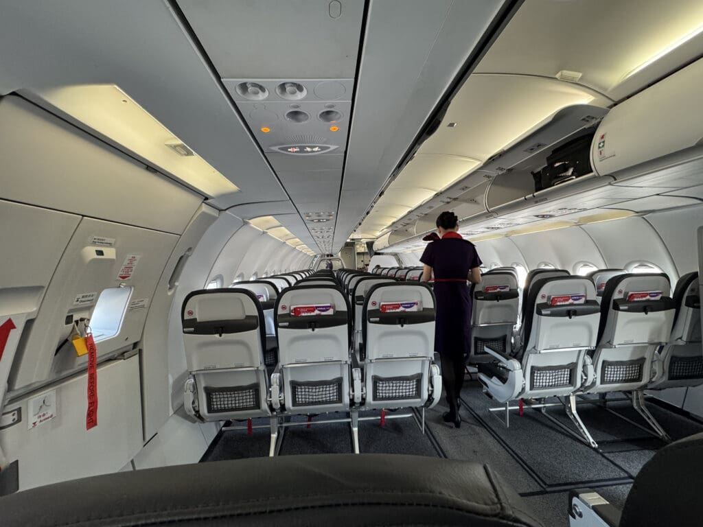 a person standing in an airplane